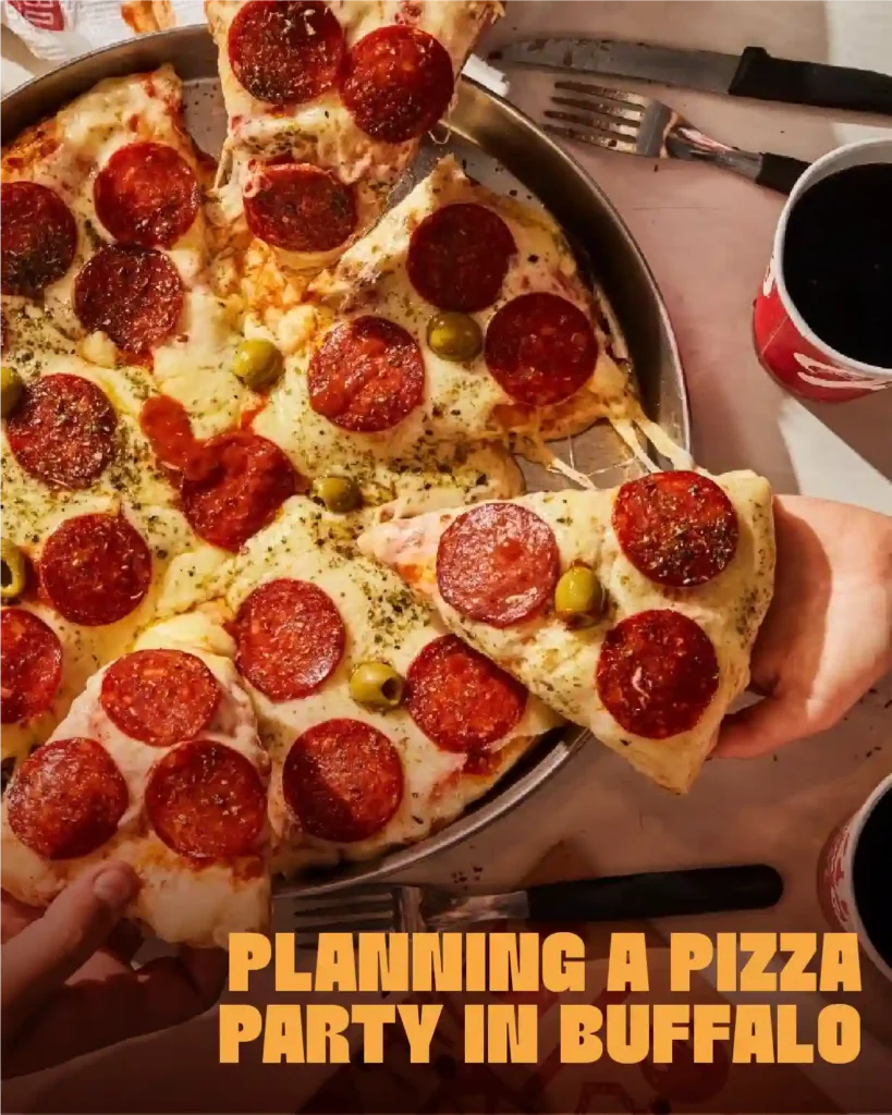 Pepperoni pizza slices with melted cheese and green olives being served at a pizza party in Buffalo.